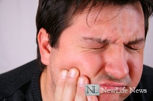Зубная боль отдает в ухо